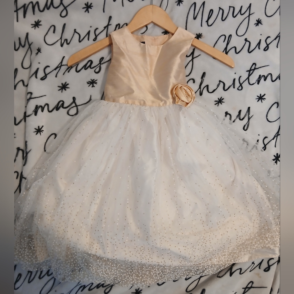 Elegant Gold and White Dress with Floral Accent
